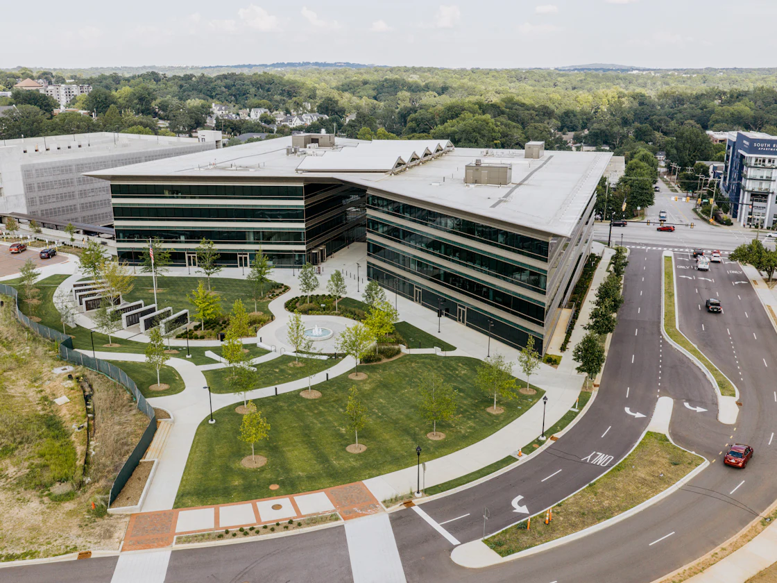 Aerial view of a commercial office complex with landscaped grounds